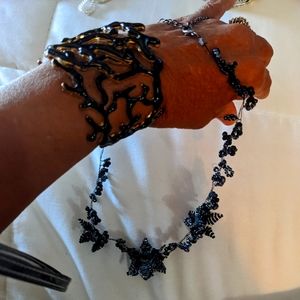 Black bracelet with beautiful flower necklace